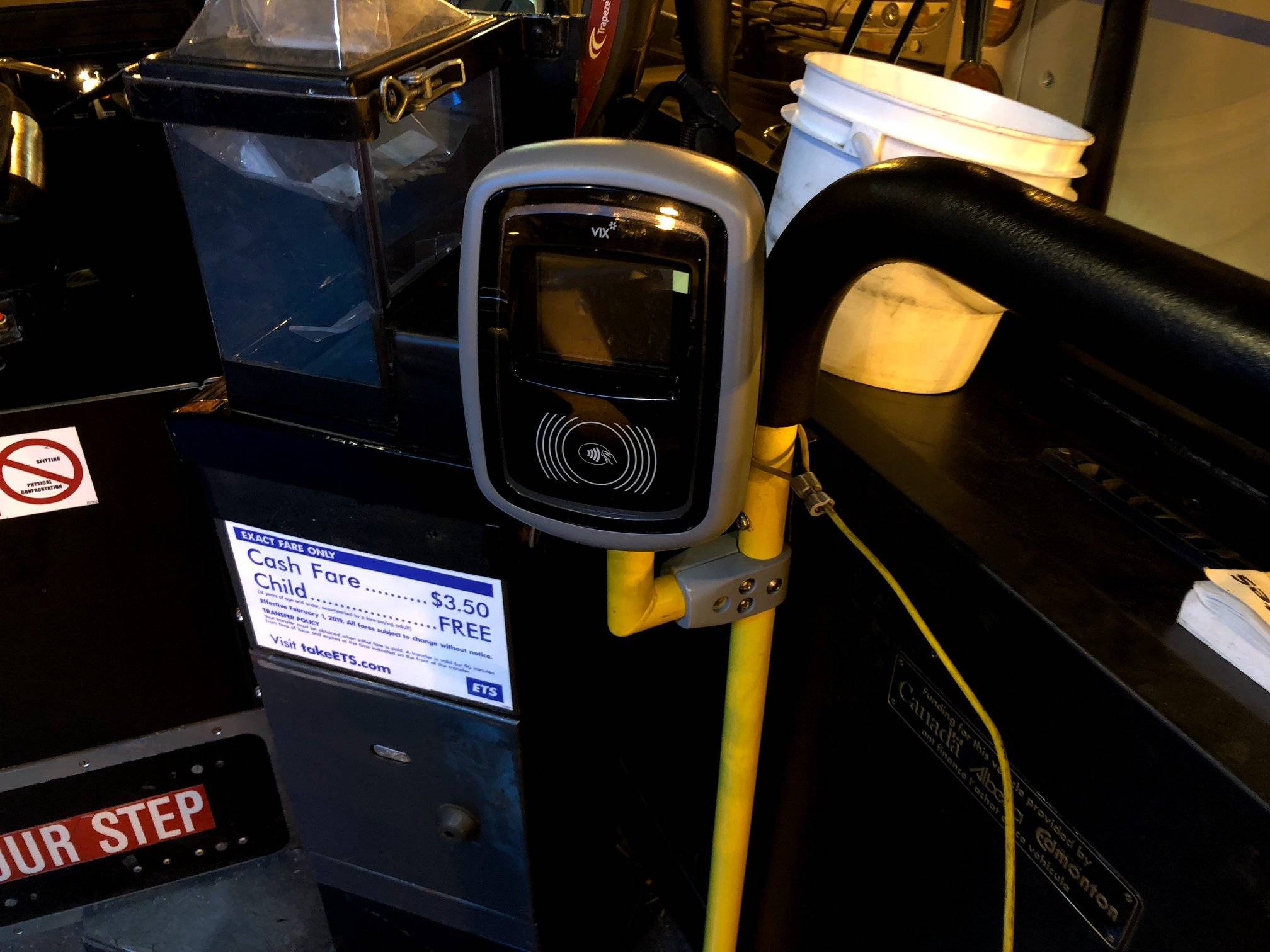 Smart fare machines finally installed on select Edmonton buses, but Calgary’s mobile system is on the fly.